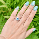 Swiss Blue Topaz & Diamond 9ct White Gold Halo Ring