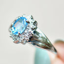 Swiss Blue Topaz & Diamond 9ct White Gold Halo Ring