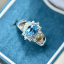 Swiss Blue Topaz & Diamond 9ct White Gold Halo Ring