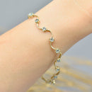 9ct Yellow Gold Aquamarine Wave Design Link Bracelet (1.60 Carats)
