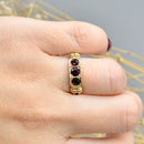 1980s Pyrope Garnet 9ct Yellow Gold Scroll Design Ring