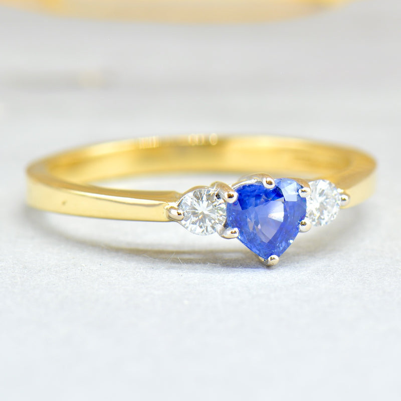 1980s Cornflower Blue Heart Shaped Sapphire & Diamond 18ct Yellow Gold Trilogy Ring (0.83ct)