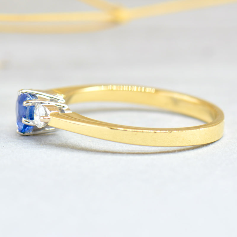 1980s Cornflower Blue Heart Shaped Sapphire & Diamond 18ct Yellow Gold Trilogy Ring (0.83ct)