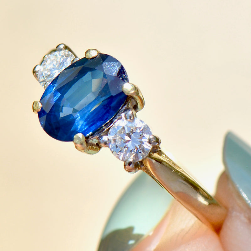 1990s Blue Sapphire and Diamond 18ct Yellow Gold Trilogy Engagement Ri