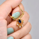 Vintage 1990s Blue Sapphire and Diamond Necklace in 9ct Yellow Gold – Egyptian Revival Inspired