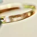 イエローサファイアとダイヤモンドの18カラットイエローゴールド5ストーンリング（0.90カラット）