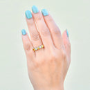 イエローサファイアとダイヤモンドの18カラットイエローゴールド5ストーンリング（0.90カラット）