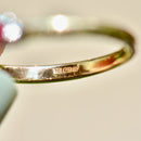 ルビーとダイヤモンドの7石18カラットイエローゴールドハーフエタニティスタッカブルバンド（0.55カラット）