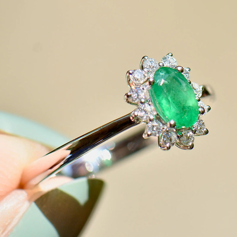 Emerald and Diamond 18ct White Gold Halo Ring (0.54ct)