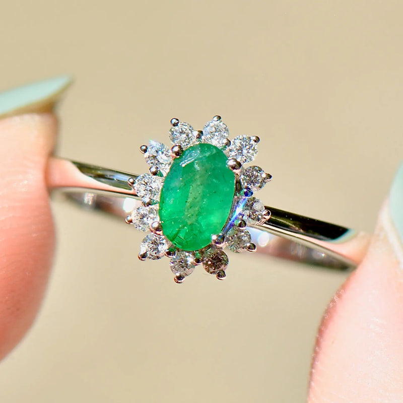 Emerald and Diamond 18ct White Gold Halo Ring (0.54ct)