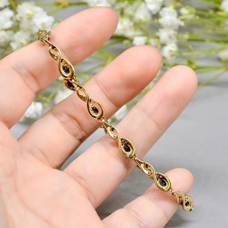 Sapphire and Diamond 9ct Yellow Gold Infinity Design Bracelet