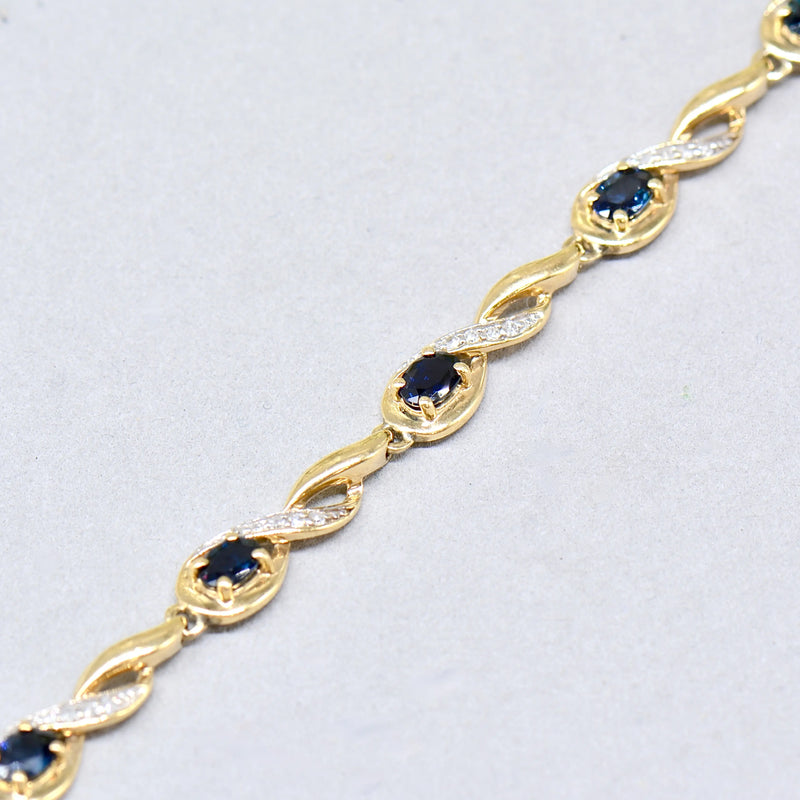Sapphire and Diamond 9ct Yellow Gold Infinity Design Bracelet
