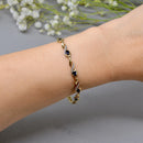 Sapphire and Diamond 9ct Yellow Gold Infinity Design Bracelet