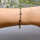 Sapphire and Diamond 9ct Yellow Gold Infinity Design Bracelet