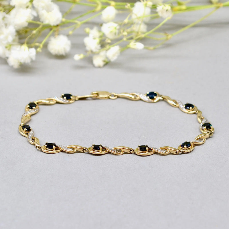 Sapphire and Diamond 9ct Yellow Gold Infinity Design Bracelet