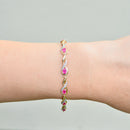 Ruby and Diamond 9ct Yellow Gold Infinity Design Bracelet