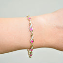 Ruby and Diamond 9ct Yellow Gold Infinity Design Bracelet