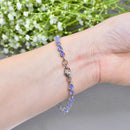 Tanzanite Trillion Cut Sterling Silver Tennis Bracelet