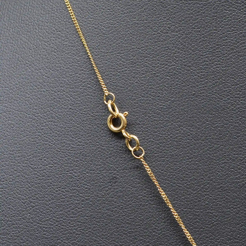 Swiss Blue Topaz and Diamond Halo Pendant With 9ct Yellow Gold Chain