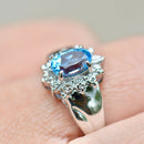 Swiss Blue Topaz & Diamond 9ct White Gold Halo Ring