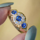 Edwardian 1912 Royal Blue Sapphire and Diamond Triple Cluster 18ct Yellow Gold Ring (0.75ct)