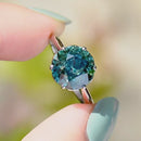 Late Deco Old European Cut Electric Teal Blue Zircon Platinum Solitaire Ring (6.60cts)