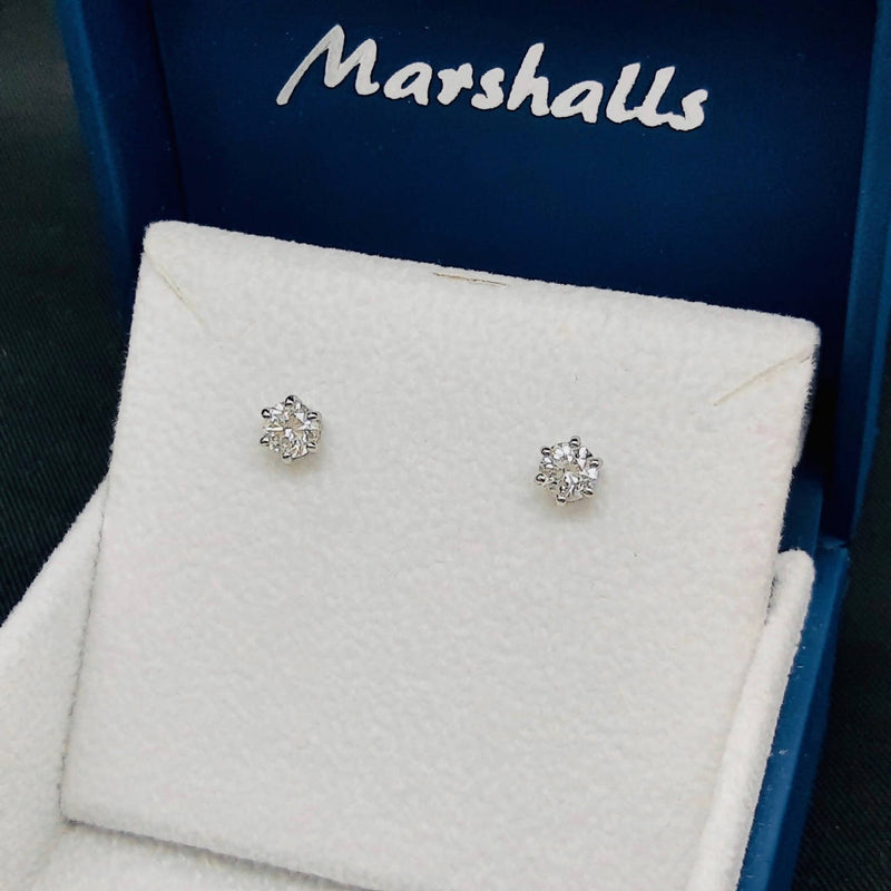 1 carat platinum set diamond stud earrings