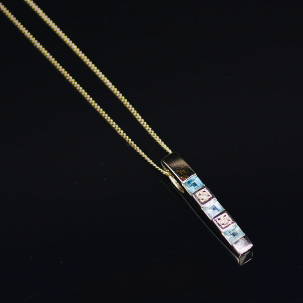 9CT White Gold Sky Blue Topaz & Diamond Pendant & Necklace
