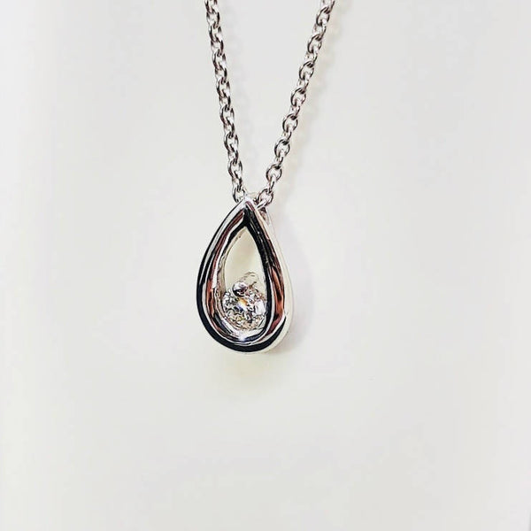 white gold diamond tear drop shape pendant and necklace