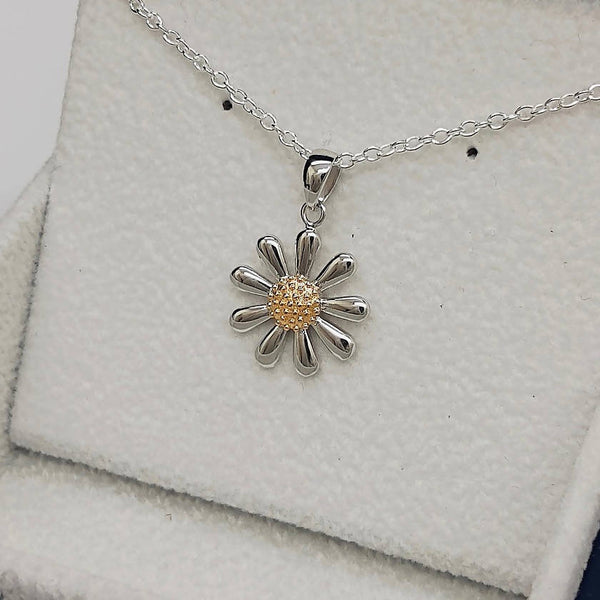 silver daisy pendant with necklace