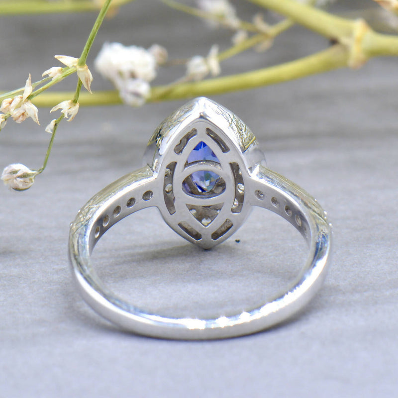 Tanzanite and White Zircons Silver Marquise Halo Ring