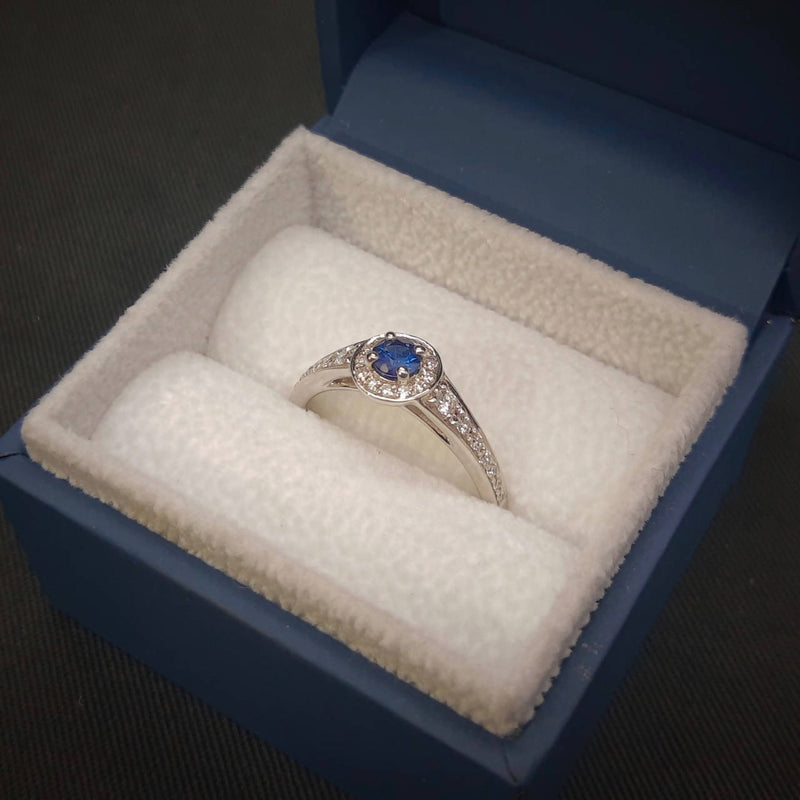 18CT White Gold Sapphire & Diamond Halo Ring