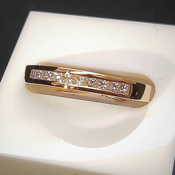 channel set half eternity diamond gold ring with princess cut diamonds. wedding ring or anniversary gift