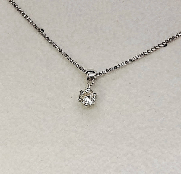 white gold solitaire diamond pendant and necklace